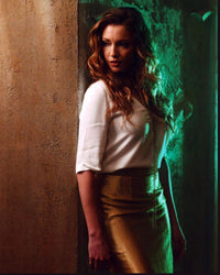 Katie Cassidy leaning against wall photo print