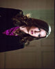 Katie Cassidy wearing a black blazer and purple shirt in Arrow photo print.