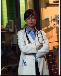 Maura Tierney E.R. photo print, arms crossed in lab coat.