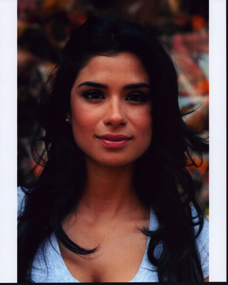 Diane Guerrero close-up photo print wearing a blue top.