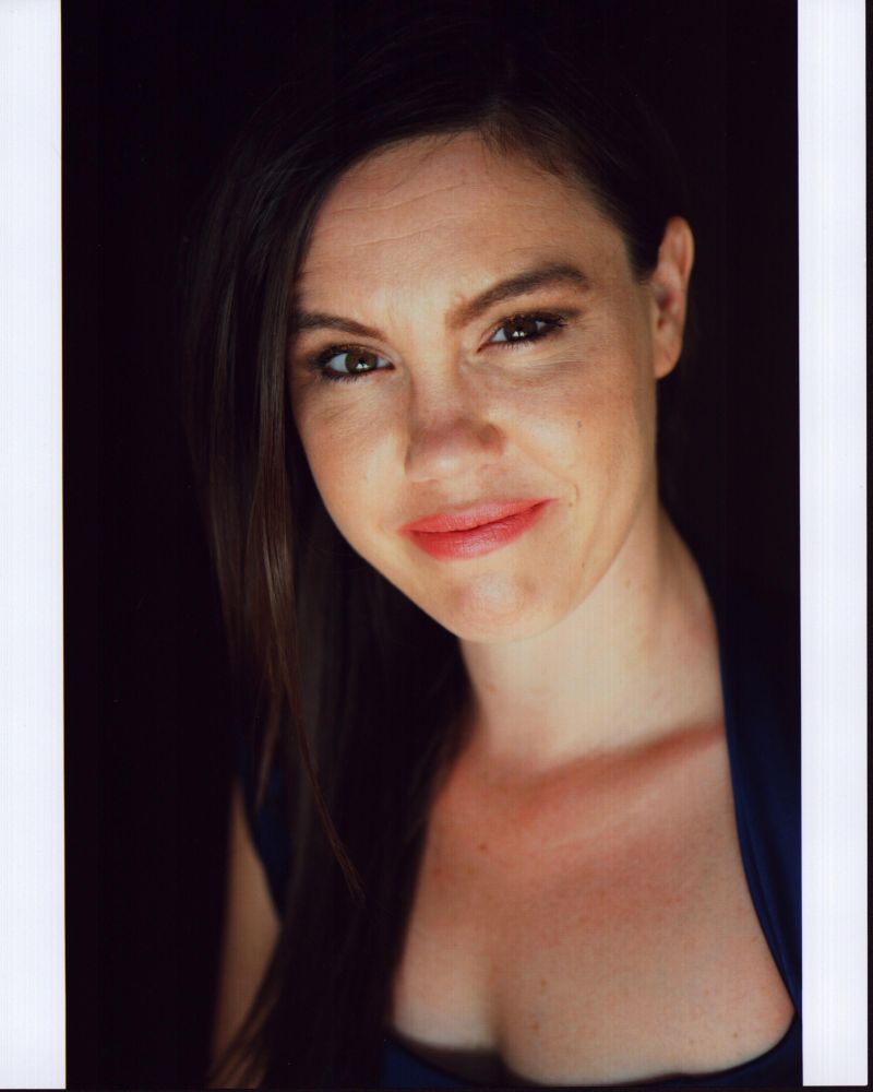 Celeste Cook headshot photo print in black top, available in multiple sizes.