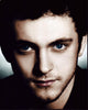 Close up photo print of George Blagden showcasing his expressive features.