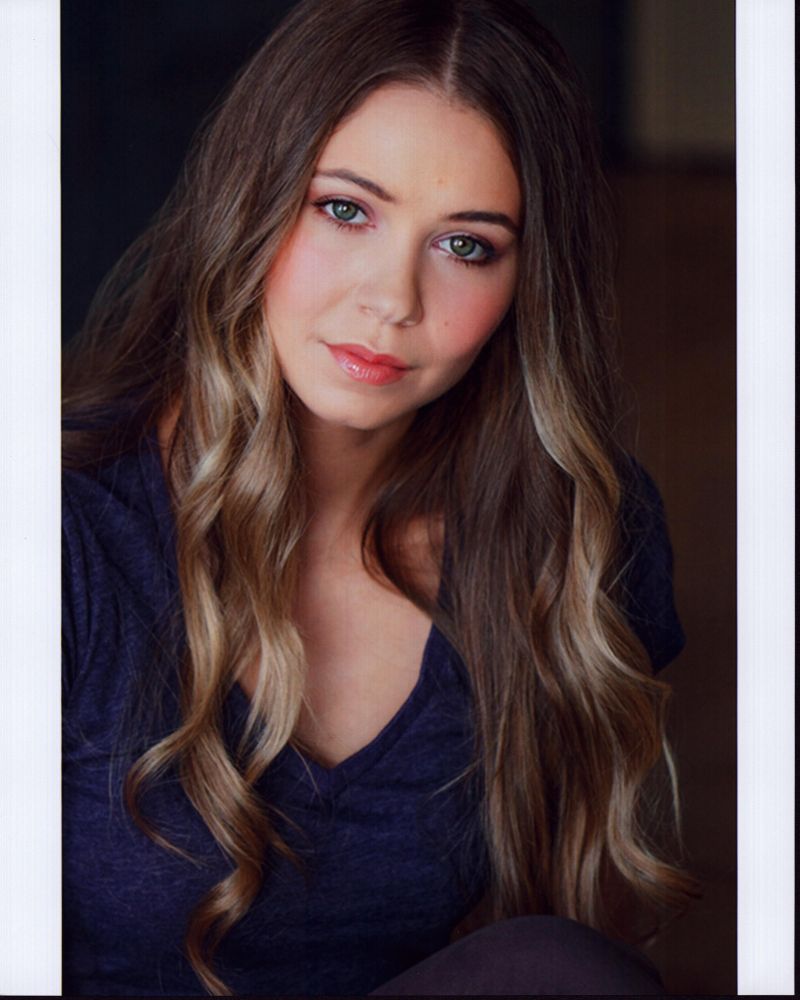 Ayla Kell headshot photo print in a gray shirt