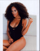 Serayah McNeill in a black swimsuit photo print