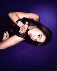 Katie Stevens Blowing Kiss Photo Print showcasing playful charm.