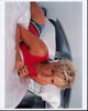Brittany Daniel laying on bed in pink tank top photo print