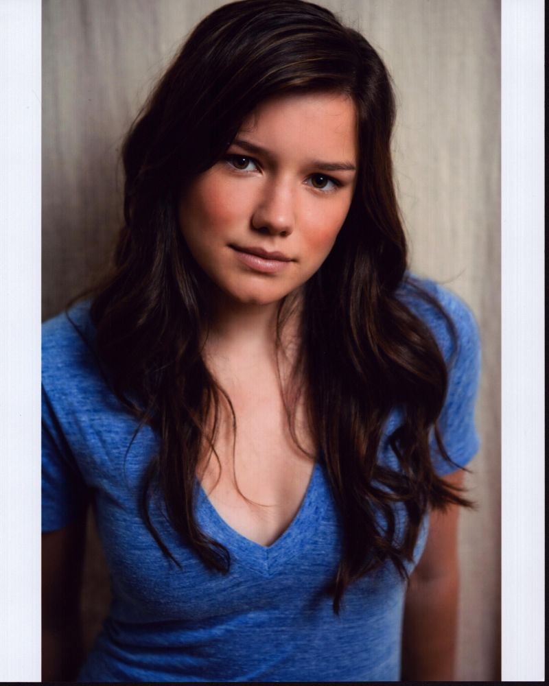 Hanna Mangan Lawrence headshot photo print in blue shirt