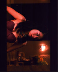 Liza Lapira in 21 photo print showcasing vibrant colors.