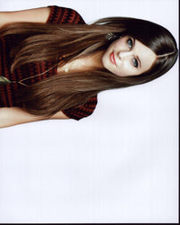 Tiffany Alvord headshot photo print in red and black top.