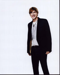 Kendall Schmidt stylish photo print in jeans and blazer.