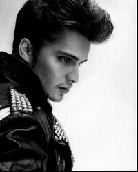 Luke Grimes black and white photo print in leather jacket.