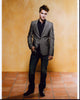 Luke Grimes stylish gray suit photo print for home decor.