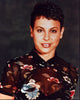 Natalie Raitano photo print in sheer and floral top.