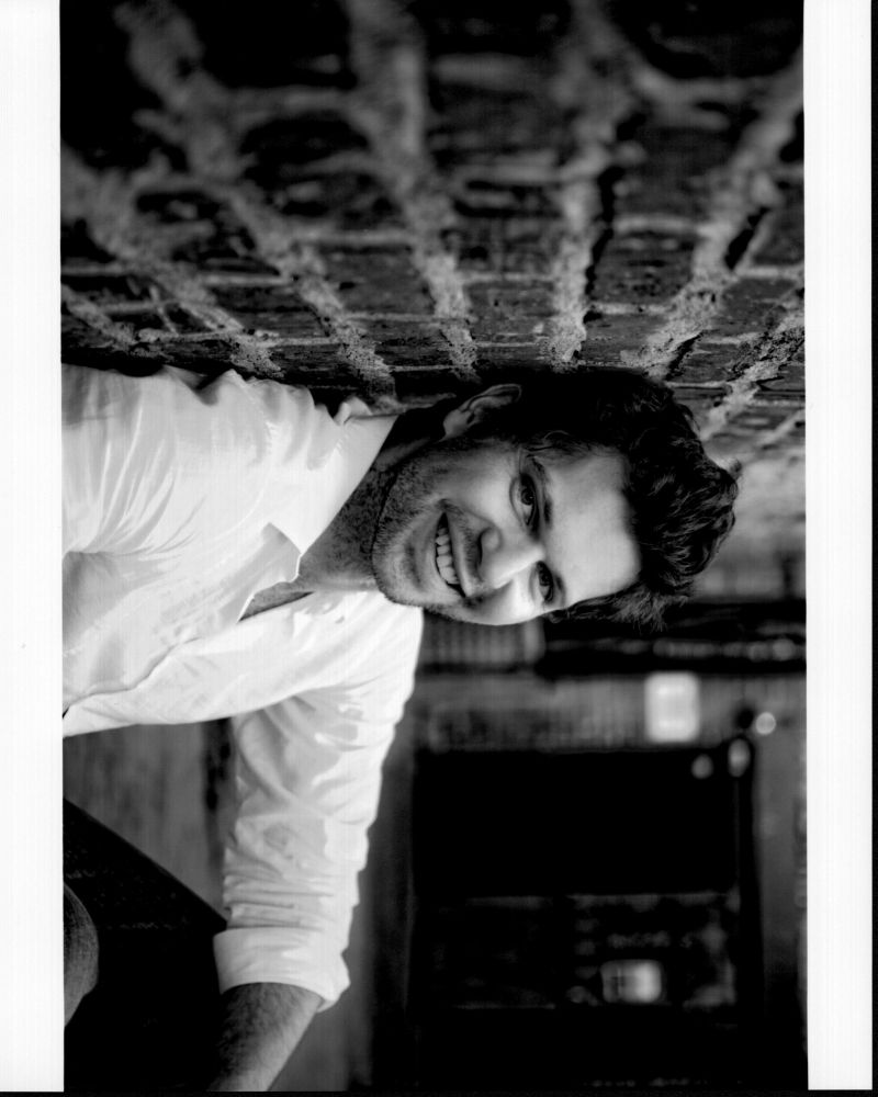 Nick Holmes Leaning On Brick Wall Black and White Photo Print