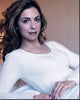 Ellen Dubin in a white sweater photo print, stylish and elegant.
