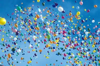 Holiday Balloons Drifting Into the Sky Poster Print by Mark Gibson