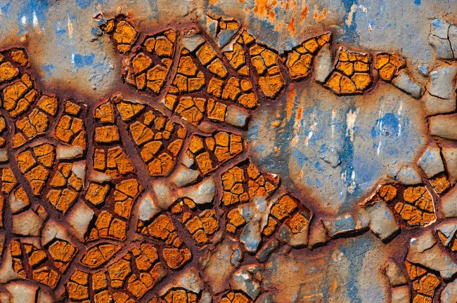 Details of rust and paint on metal poster print by Zandria Muench Beraldo.
