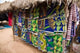 West Africa Benin Textiles in Thatched Market Poster Print by Aldo Pavan