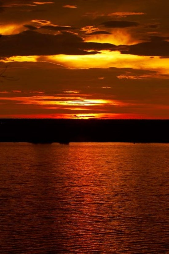 Sunset Over Chobe River from Sedudu Bar Poster Print by David Wall