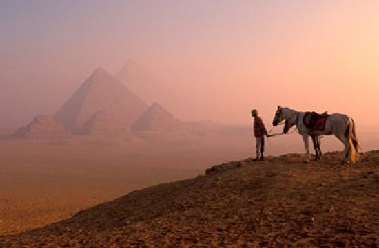 Dawn View of Guide and Horses at the Giza Pyramids Poster Print by Walter Bibikow