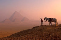 Dawn View of Guide and Horses at the Giza Pyramids Poster Print by Walter Bibikow