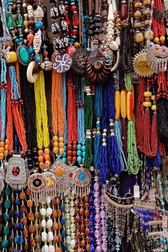 Souvenir necklaces displayed at a market in Luxor, Egypt poster print