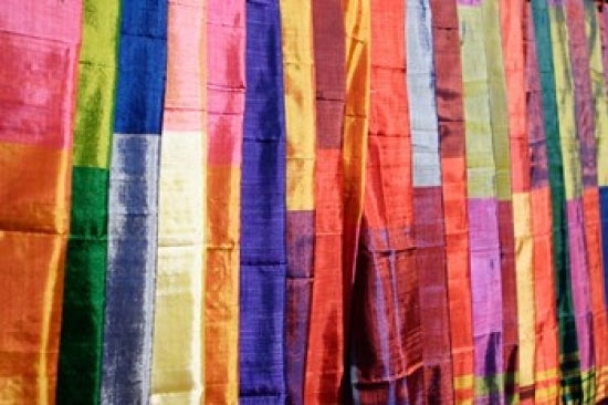Colorful Silk Scarves at Edfu Market poster print by Michele Molinari