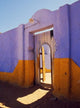 Courtyard Entrance in Nubian Village Across the Nile from Luxor, Egypt poster print by Tom Haseltine.