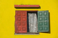 Madagascar colorful window print near Antananarivo by Kevin Schafer