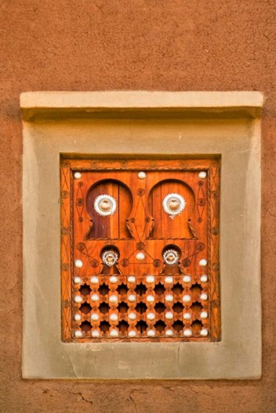 Ornate detail of a wooden window in Djenne, Mali poster print by Janis Miglavs
