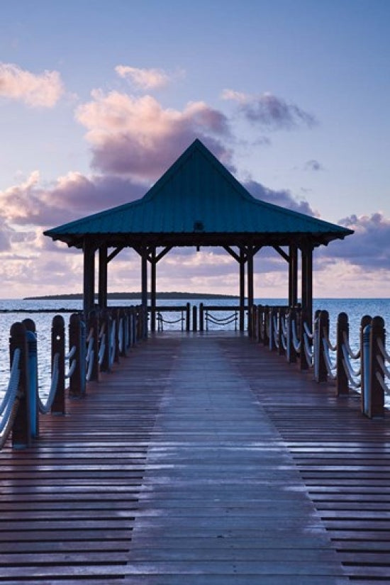 Mauritius Mahebourg waterfront pier at dawn poster print by Walter Bibikow