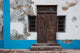 Traditional carved door in Quirmbas National Park poster print by Alida Latham.
