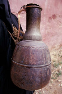 Copper water jug carried from well to homes - Moroccan poster print.