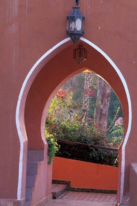 Arched Door and Garden Poster Print by John & Lisa Merrill