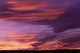 Pink Desert Clouds at Sunset Poster Print by Walter Bibikow