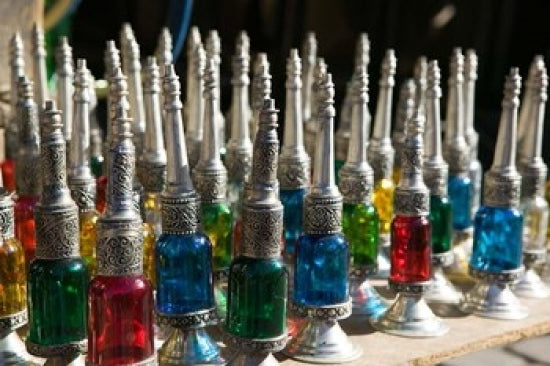 Perfume Bottles from The Souqs of Marrakech by Walter Bibikow - Poster Print