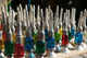 Perfume Bottles from The Souqs of Marrakech by Walter Bibikow - Poster Print