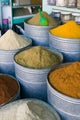 Spices of the Souqs of Marrakech Poster Print by Walter Bibikow, showcasing vibrant spices and Moroccan culture.