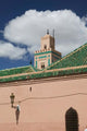 Mosque in Old Marrakech Poster Print by Walter Bibikow - Captivating Moroccan architecture.
