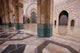 Al-Hassan II Mosque Poster Print by William Sutton showcasing Moroccan architecture.
