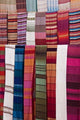 Woven Fabrics of Morocco Poster Print by William Sutton showcasing intricate patterns and vibrant colors.