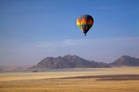 Hot air balloon over Namib Desert art print by David Wall