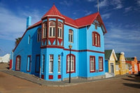 Colorful German colonial architecture poster print featuring Luderitz, Namibia by David Wall.