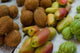 Mangos and Coconuts at the Market on Mahe Island Poster Print by Alison Wright.