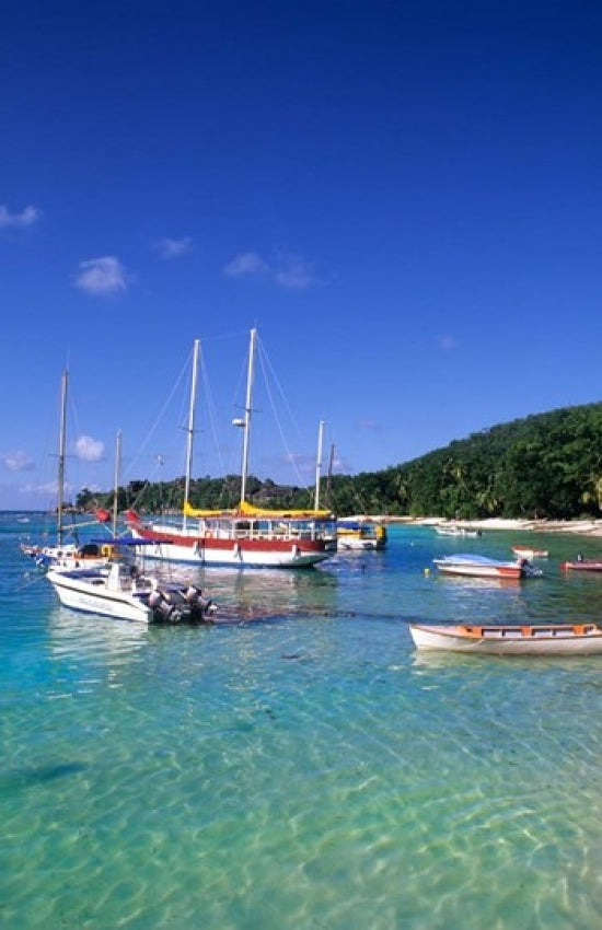 Boats at La Digue Beach, Seychelles Poster Print by Bill Bachmann
