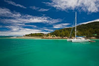 Seychelles La Digue Island waterfront poster print by Walter Bibikow.