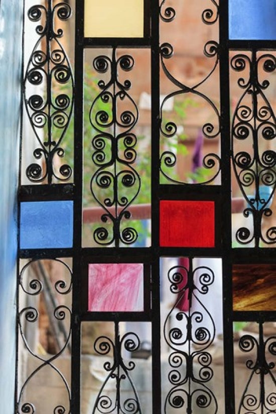 Stained glass and iron door in Stone Town, Zanzibar, poster print by Alida Latham