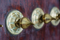 Close-up of traditional carved door from Stone Town, Zanzibar, Tanzania poster print by Alida Latham.