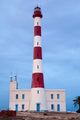 Taguermes Lighthouse at Dawn Poster Print by Walter Bibikow, depicting Sidi Mahres Beach, Jerba Island, Tunisia.