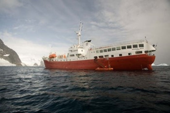 Expedition Ship and Zodiac at Pleneau Island, Antarctica Poster Print
